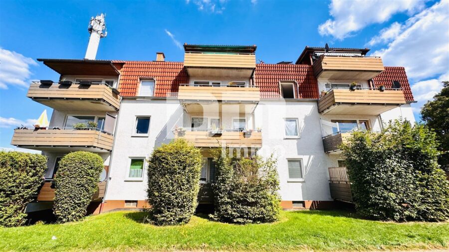 (R)eserviert!WE3 - Moderne Dreizimmerwohnung BJ 1991 mit sonnigem Balkon in zentraler Lage - Rückansicht